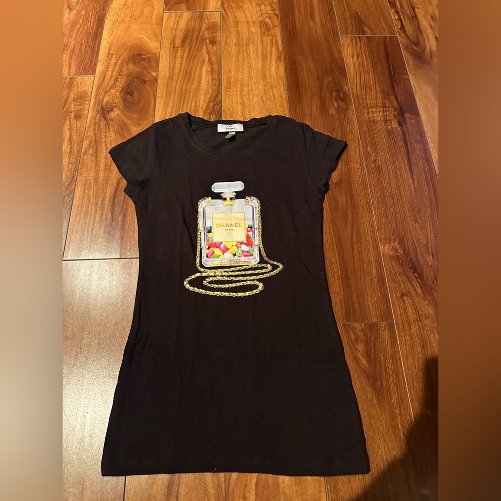 Black Dress with Gold and Multicolor Perfume Bottle Design